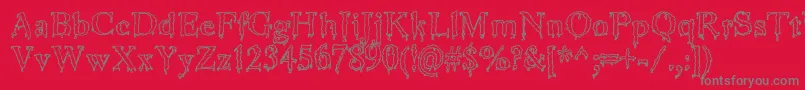 JinkeezOut Font – Gray Fonts on Red Background