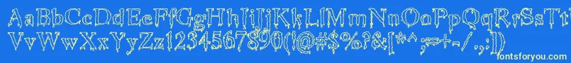 JinkeezOut Font – Yellow Fonts on Blue Background