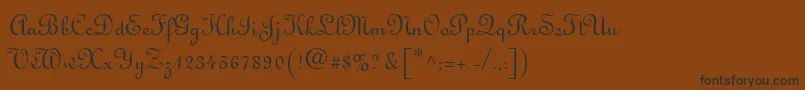 フォントMonasteryScriptSsi – 黒い文字が茶色の背景にあります