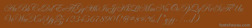 EdwardianScrItcTt-Schriftart – Graue Schriften auf braunem Hintergrund