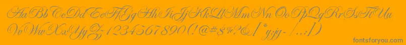 EdwardianScrItcTt-Schriftart – Graue Schriften auf orangefarbenem Hintergrund