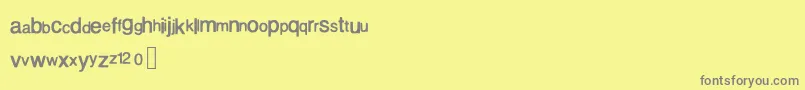 フォントPerdido – 黄色の背景に灰色の文字