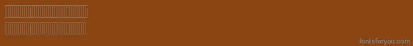 Czcionka Hisham – szare czcionki na brązowym tle