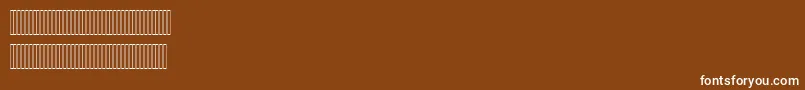 Czcionka Hisham – białe czcionki na brązowym tle