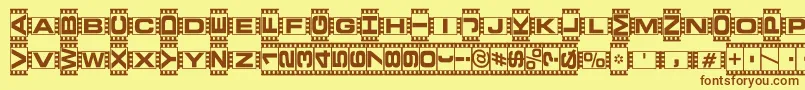 フォントVedeb ffy – 茶色の文字が黄色の背景にあります。