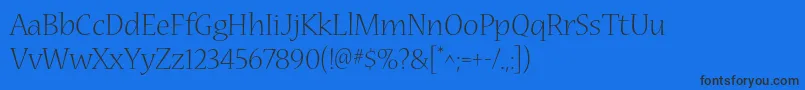 NuevastdLight Font – Black Fonts on Blue Background