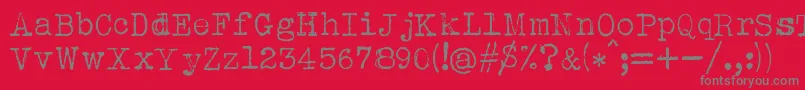 フォントAlbertsthalTypewriter – 赤い背景に灰色の文字