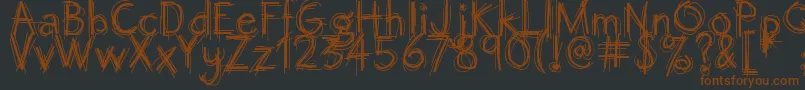 Octemberscript-fontti – ruskeat fontit mustalla taustalla