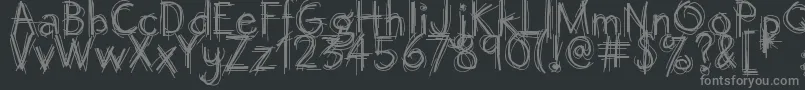 フォントOctemberscript – 黒い背景に灰色の文字