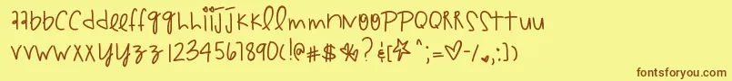 Hyperpunchpink-Schriftart – Braune Schriften auf gelbem Hintergrund