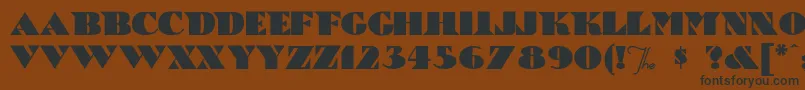 フォントBricABraque – 黒い文字が茶色の背景にあります