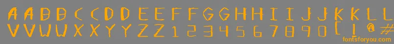 フォントOpensticks – オレンジの文字は灰色の背景にあります。