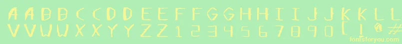 フォントOpensticks – 黄色の文字が緑の背景にあります