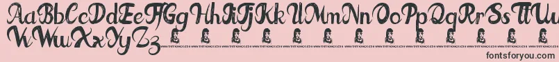 FatTats Font – Black Fonts on Pink Background