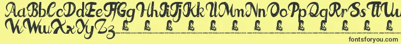 FatTats Font – Black Fonts on Yellow Background