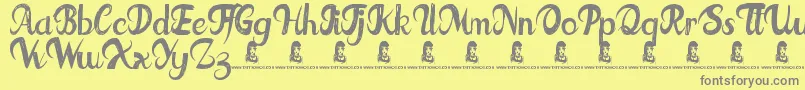 FatTats Font – Gray Fonts on Yellow Background