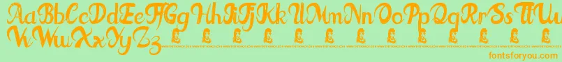 フォントFatTats – オレンジの文字が緑の背景にあります。