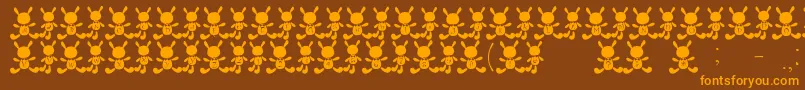 fuente CUsafont – Fuentes Naranjas Sobre Fondo Marrón