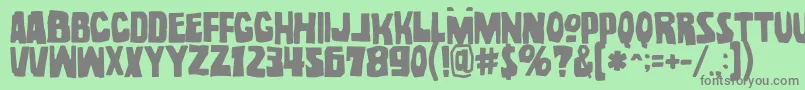 NoelGallagherWithAccentsOpentype Font – Gray Fonts on Green Background