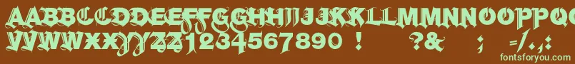 フォントHelbla – 緑色の文字が茶色の背景にあります。