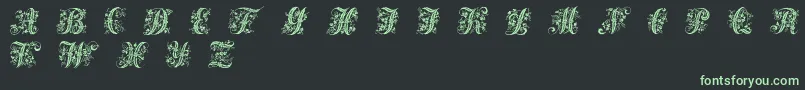 フォントVictorianInitialsOne – 黒い背景に緑の文字
