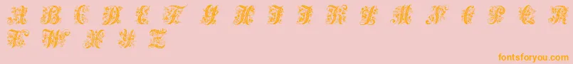 VictorianInitialsOne-Schriftart – Orangefarbene Schriften auf rosa Hintergrund