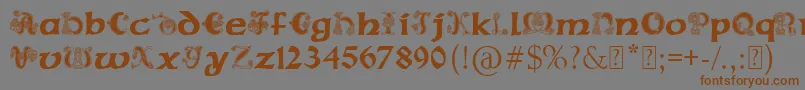 フォントPaulsCelticFont2 – 茶色の文字が灰色の背景にあります。