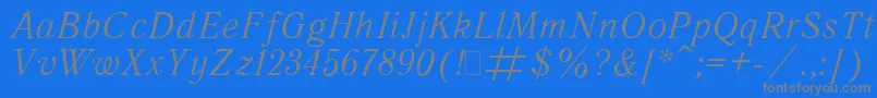 フォントQuantita – 青い背景に灰色の文字