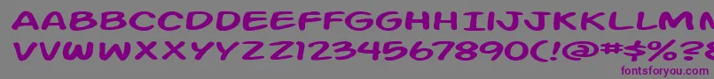 フォントActionManExtended – 紫色のフォント、灰色の背景