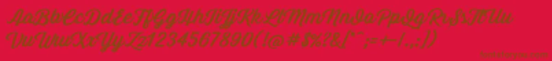 GrandAventure Font – Brown Fonts on Red Background