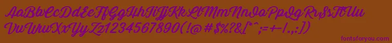 GrandAventure Font – Purple Fonts on Brown Background