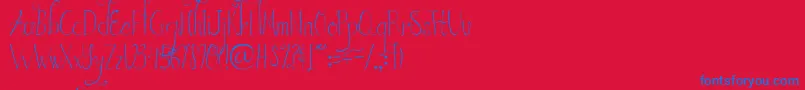 AustieBostInWonderland Font – Blue Fonts on Red Background