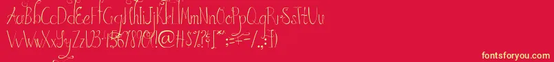 AustieBostInWonderland Font – Yellow Fonts on Red Background