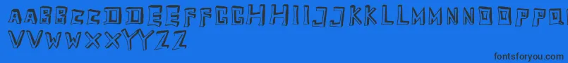 TobyfontEmpty-Schriftart – Schwarze Schriften auf blauem Hintergrund