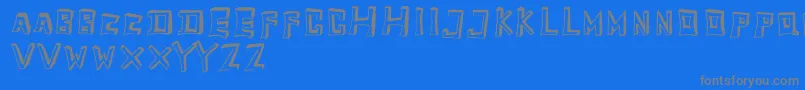 フォントTobyfontEmpty – 青い背景に灰色の文字