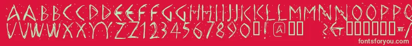 Hellasdust-Schriftart – Grüne Schriften auf rotem Hintergrund