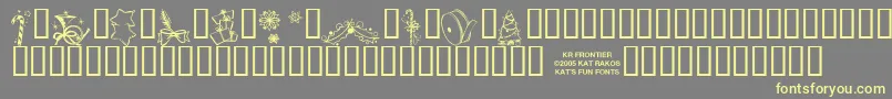 KrChristmasJewels20055 Font – Yellow Fonts on Gray Background