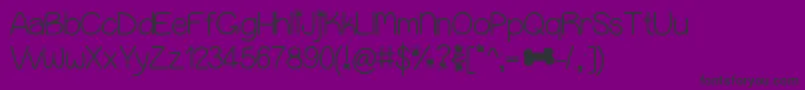 Czcionka Puppybellies – czarne czcionki na fioletowym tle