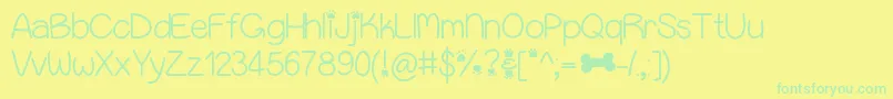 Puppybellies-Schriftart – Grüne Schriften auf gelbem Hintergrund