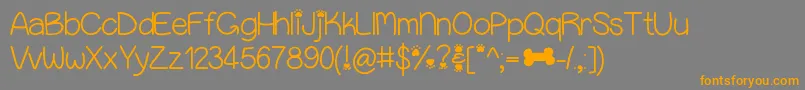 Puppybellies Font – Orange Fonts on Gray Background
