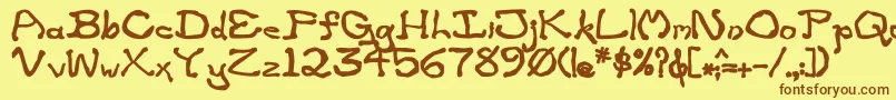フォントZippitteyBold – 茶色の文字が黄色の背景にあります。