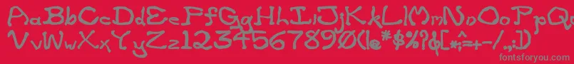 ZippitteyBold-fontti – harmaat kirjasimet punaisella taustalla