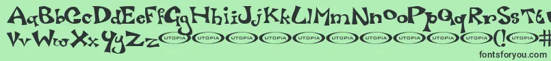 フォントLuxo – 緑の背景に黒い文字