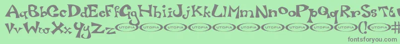 フォントLuxo – 緑の背景に灰色の文字