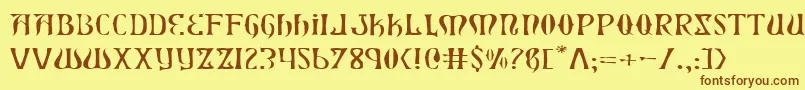 フォントXiphosel – 茶色の文字が黄色の背景にあります。