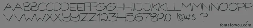 フォントGorillaComixLight – 黒い文字の灰色の背景