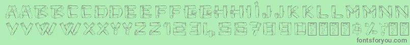 Timbers-Schriftart – Graue Schriften auf grünem Hintergrund