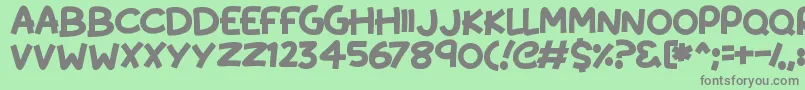 フォントKissyHugs – 緑の背景に灰色の文字