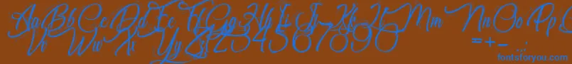 ChocolatineDuDimanche-Schriftart – Blaue Schriften auf braunem Hintergrund