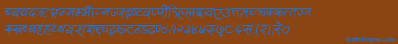 AnandaAkchyarBold Font – Blue Fonts on Brown Background